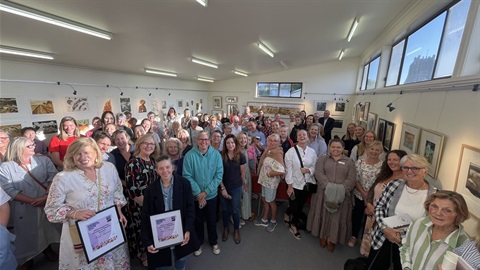 2024 Inspiring women winners with awards event crowd